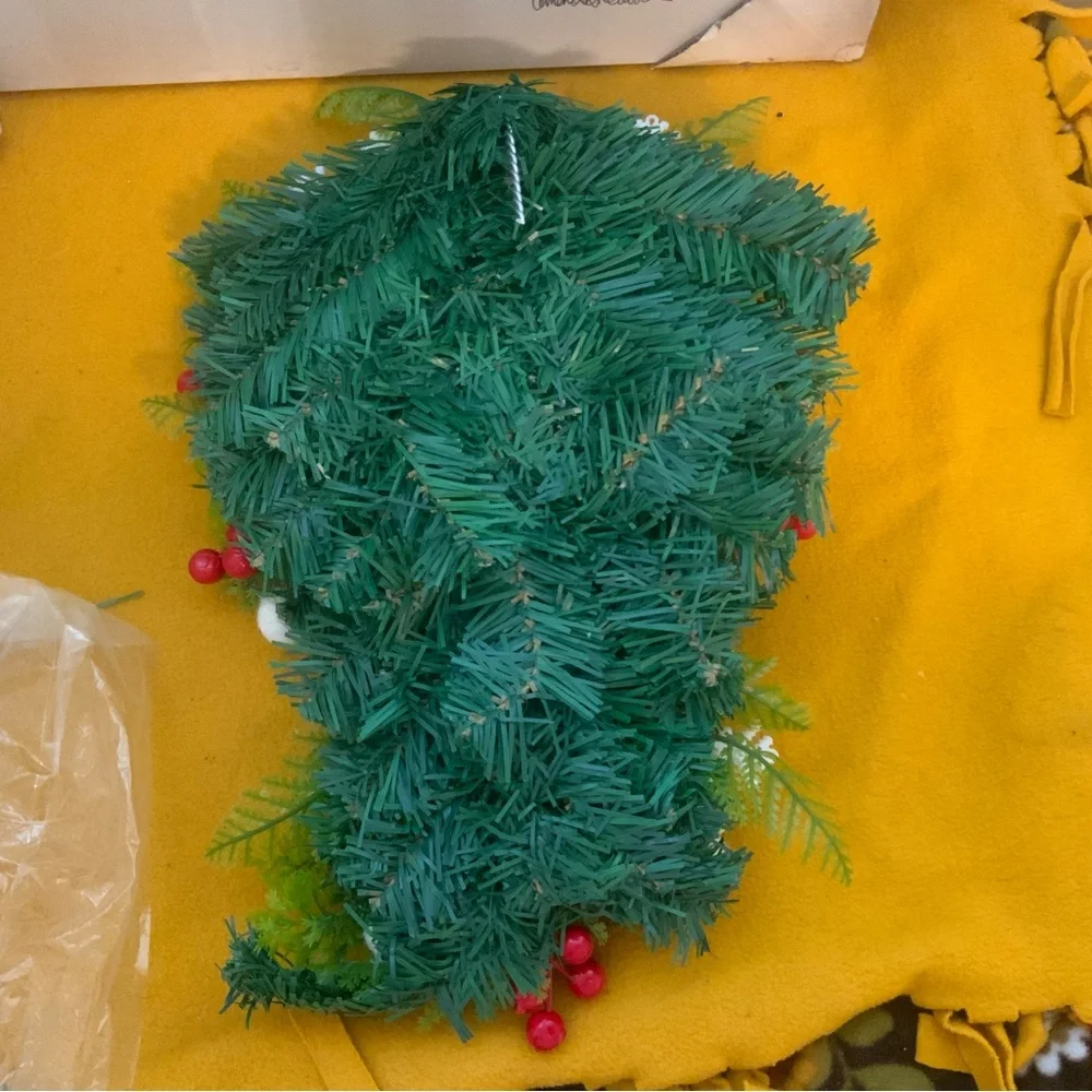 Holiday artificial Christmas teardrop swag for inside or outside decoration